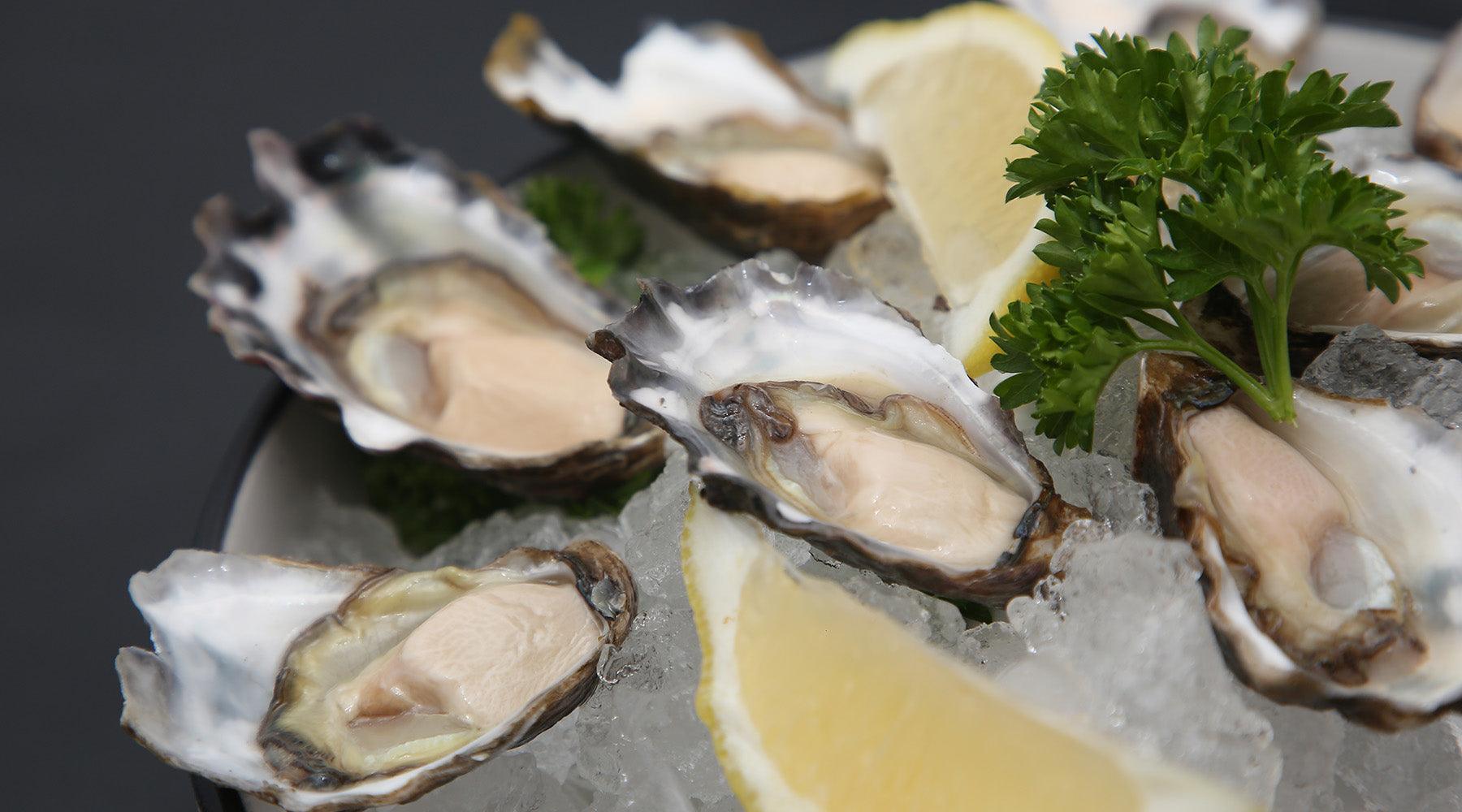 Oyster platter with lemons