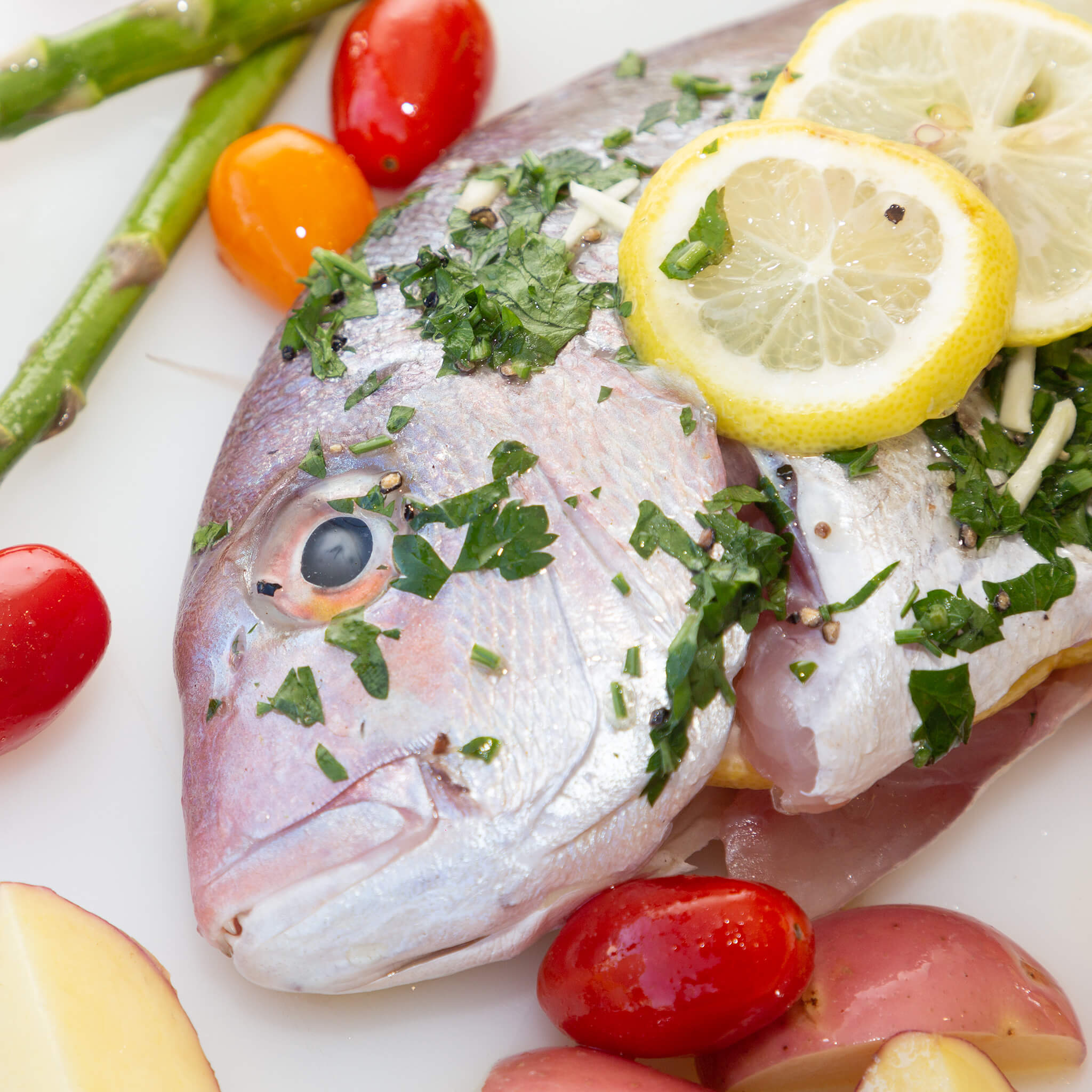 marinated New Zealand line caught Snapper in fresh lemons, parsley, garlic, olive oil, salt and pepper. DIY kit SERVE 2 DIY kit SERVE 2