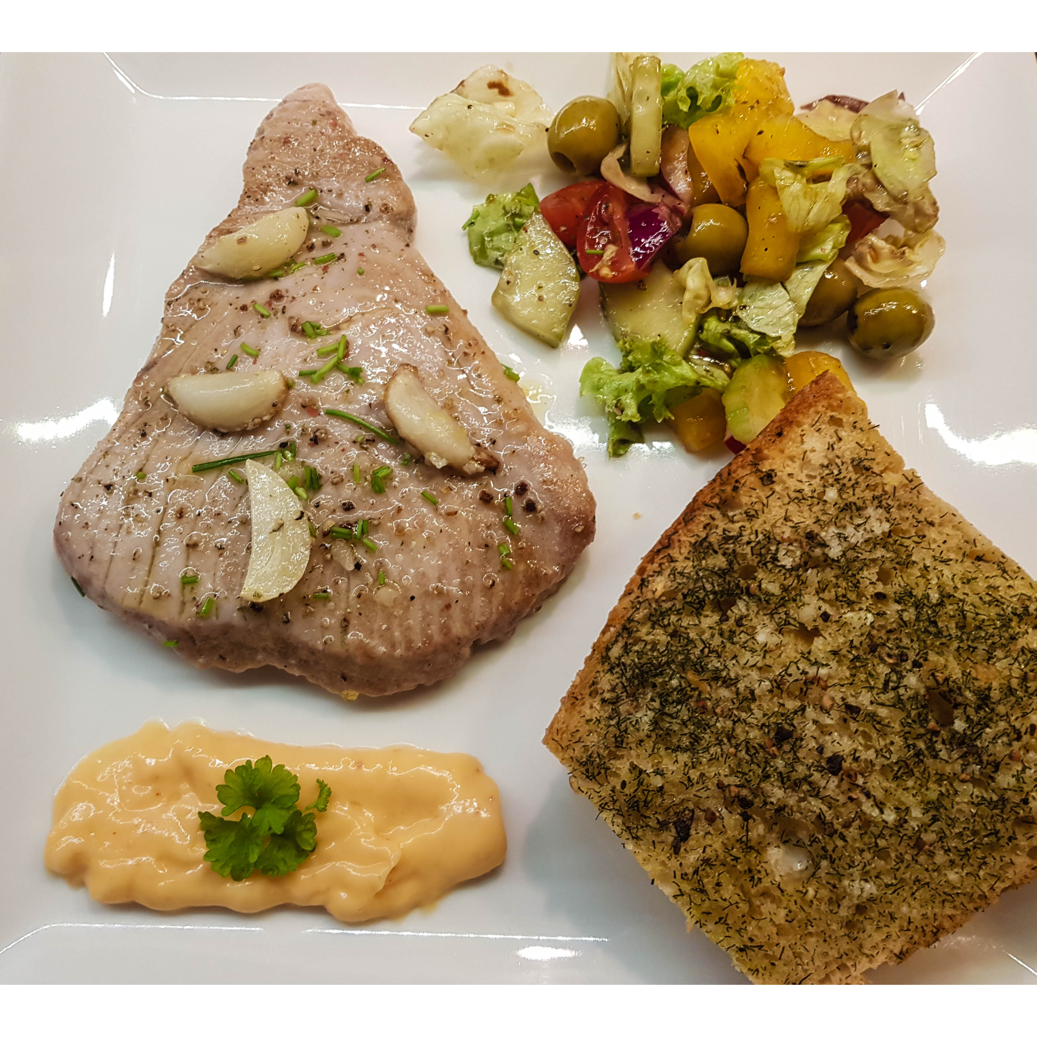 Yellow Fin Tuna Steaks with sauce and salad from Steve Costi seafood